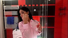 Hot petite brunette babe in the bathroom prepares for a night out in panties and a shirt