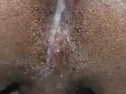 Cum running from Jamaican ass with clit.