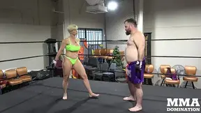 Blonde Rapture Wrestles Muscular Man in Ring Dominance