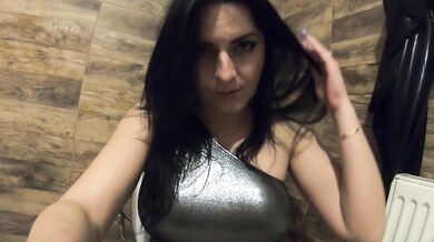 Tight shiny jumpsuit tease with big tits and bathroom pee play