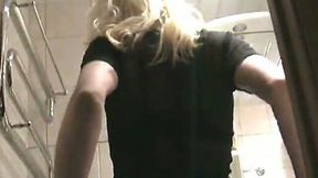 Blonde natural slim chick Ksusha flashes big pussy lips while pissing