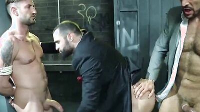 Good looking gentlemen are enjoying in hard core gay 3some