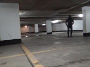 wetsuited & masked in parking garage