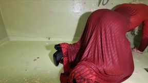 In the shower in a long red dress