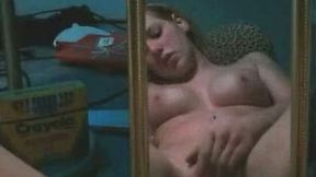Rubbing and fingering my grooling shaved cunt in front of the mirror
