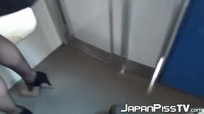 Japanese brunette  close up peeing in train