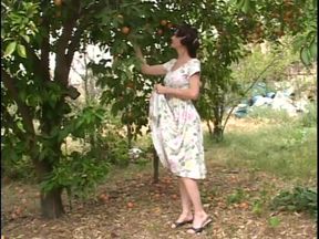 Mature woman gets a younger woman naked outside and fingers her cunt